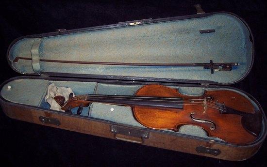 Appraisal: A violin and bow in a fitted walnut case labelled