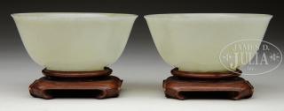 Appraisal: PAIR OF CARVED JADE FOOTED BOWLS th century China Each