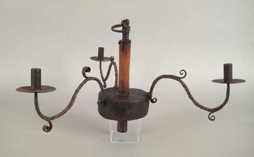 Appraisal: Continental oak and wrought iron three arm chandelier th c