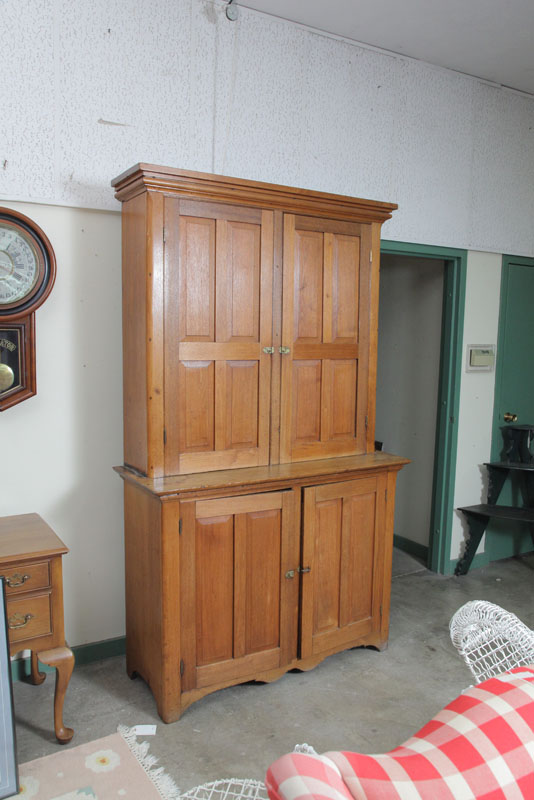 Appraisal: STEPBACK CUPBOARD Butternut with a molded cornice four blind and