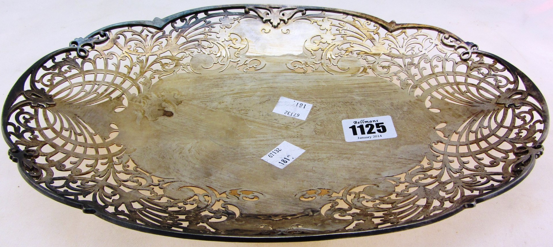 Appraisal: A silver dish of shaped oval form with scroll pierced