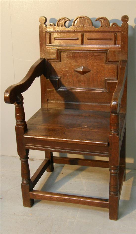 Appraisal: th century oak wainscot chair with shaped top the panelled