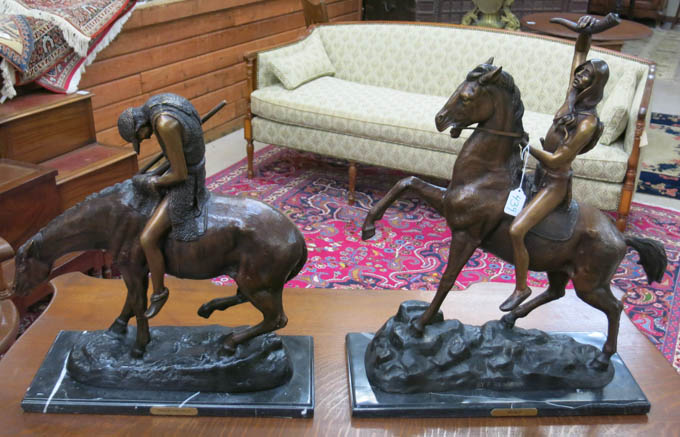 Appraisal: TWO PATINATED BRONZE SCULPTURES depicting American Indian figures on horseback