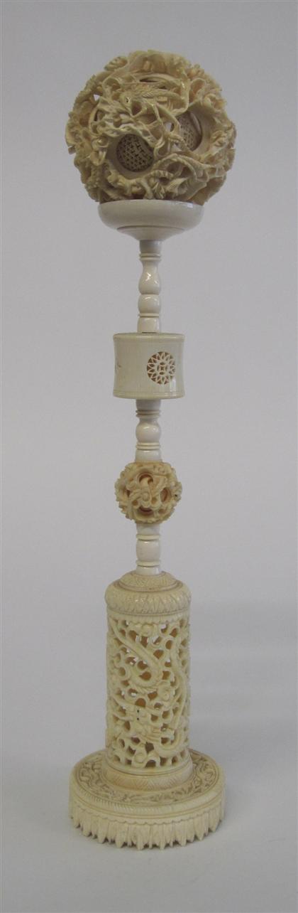 Appraisal: Chinese elephant ivory puzzle ball on stand early th century