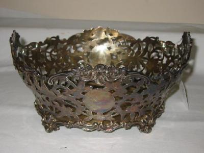 Appraisal: A VICTORIAN FRUIT BASKET of oval form the whole pierced