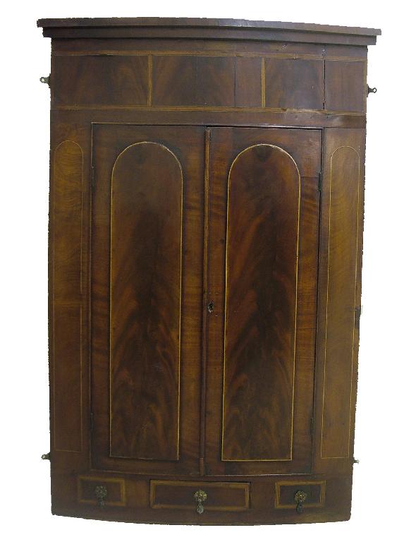 Appraisal: th century large mahogany bow front corner cabinet inlaid with