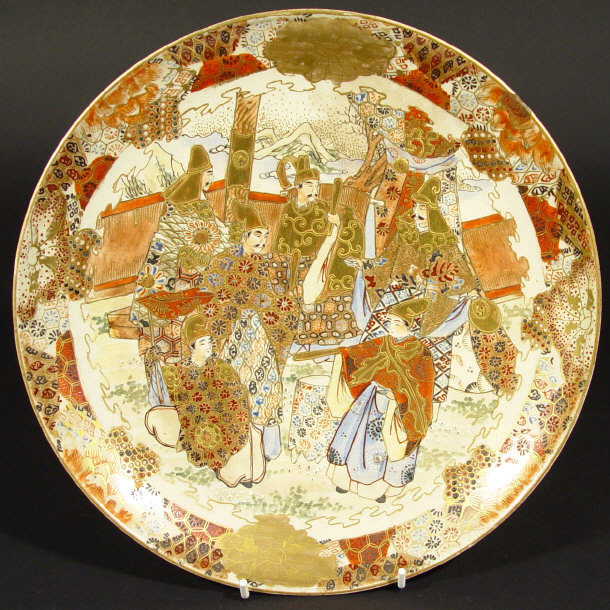 Appraisal: Japanese Satsuma pottery plate hand painted and gilded with robed