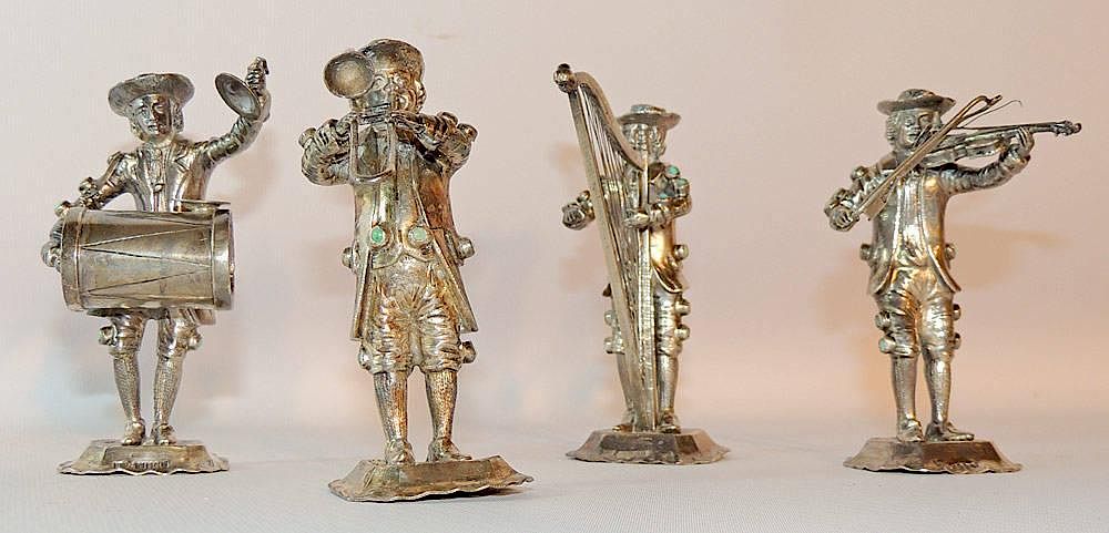 Appraisal: Four Jeweled Silver Musicians Set includes a harpist a trombone