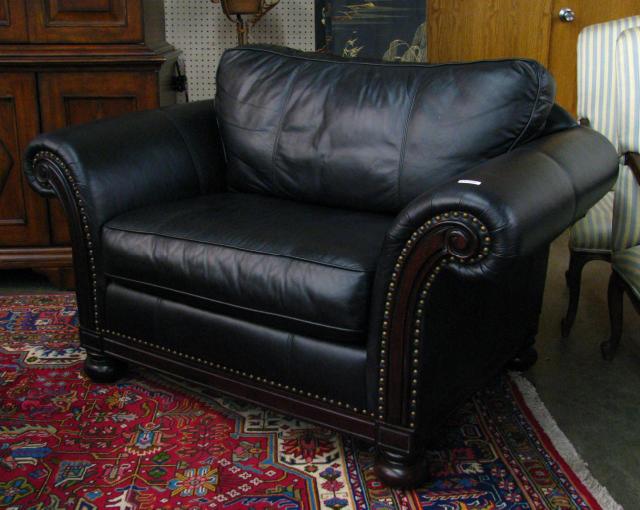 Appraisal: Traditional Style leather chair and a half by Bernhardt from