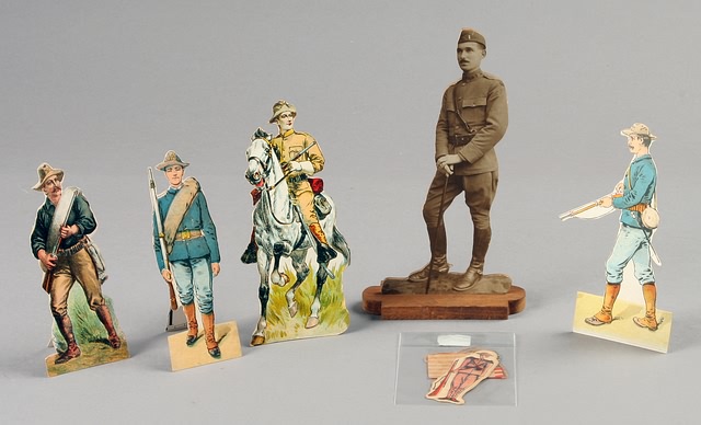 Appraisal: cigar cutouts soldier and flag cutout and soldier mounted cutout