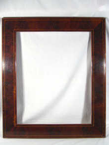 Appraisal: A large Edwardian mahogany veneered picture mirror frame with boxwood