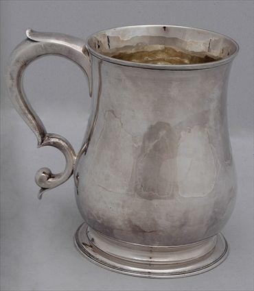 Appraisal: GEORGE II SILVER BALUSTER-FORM MUG Maker's mark rubbed London the