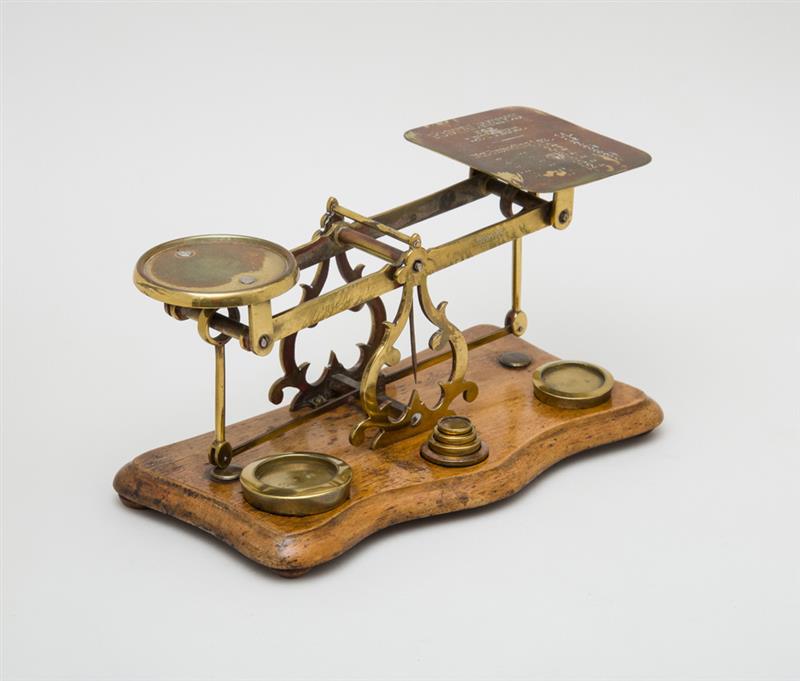 Appraisal: Victorian Brass Postal Scale On walnut base the weighing pan