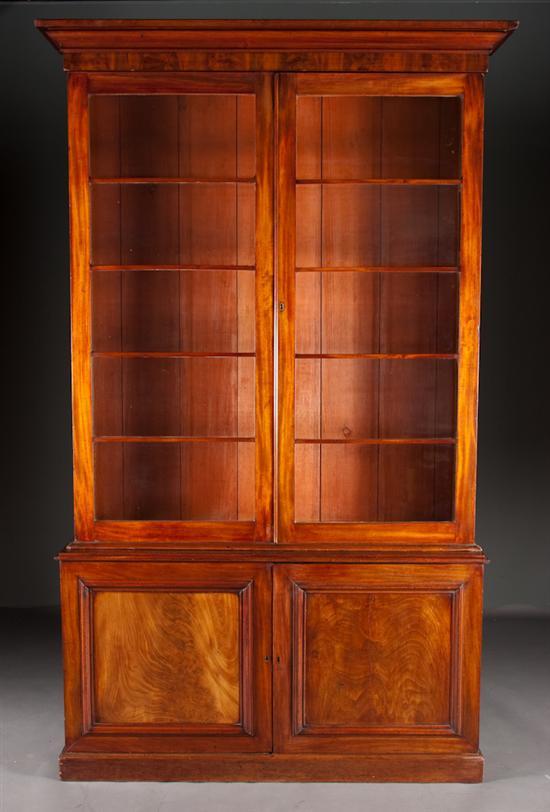 Appraisal: Victorian mahogany and glazed panel two-door bookcase th century in