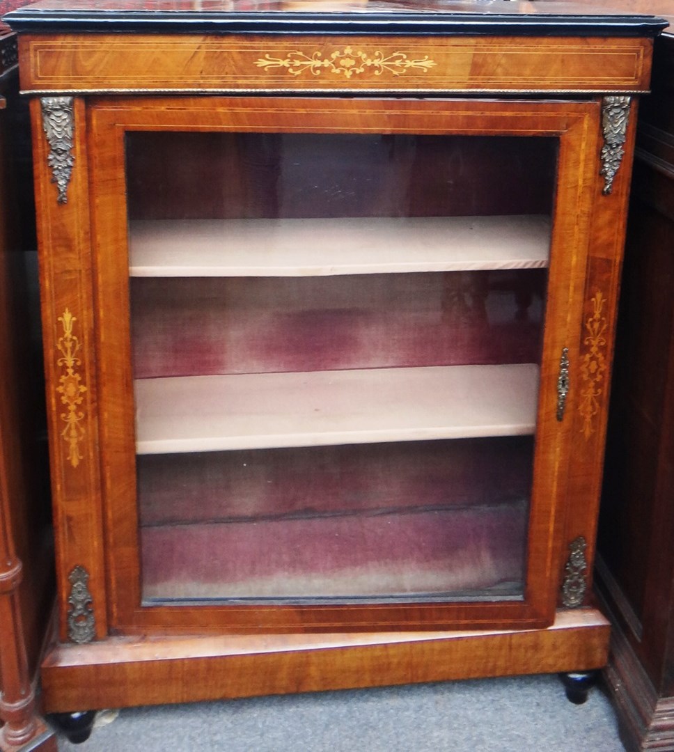 Appraisal: A Victorian marquetry inlaid gilt metal mounted pier cabinet with