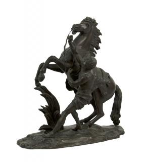 Appraisal: A CAST METAL SCULPTURE OF HORSE AND MAN IN THE