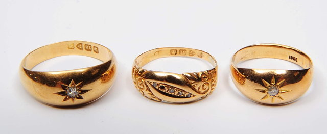 Appraisal: Three ct gold ringsincluding two with gypsy style diamond settings