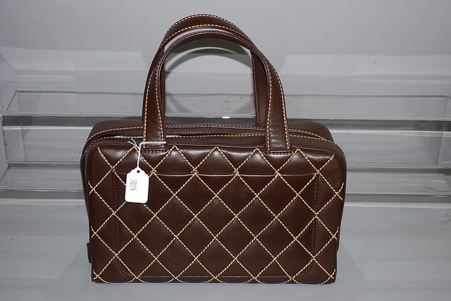 Appraisal: Chanel brown leather handbag w tan stitching signature quilting zip