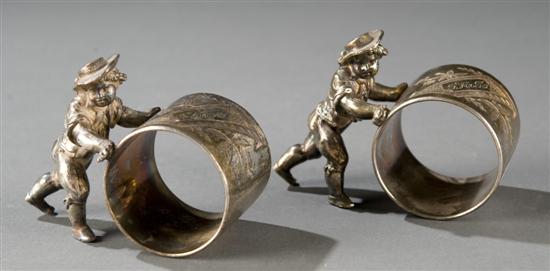 Appraisal: Pair of Meriden Company silver plate figural napkin rings Late