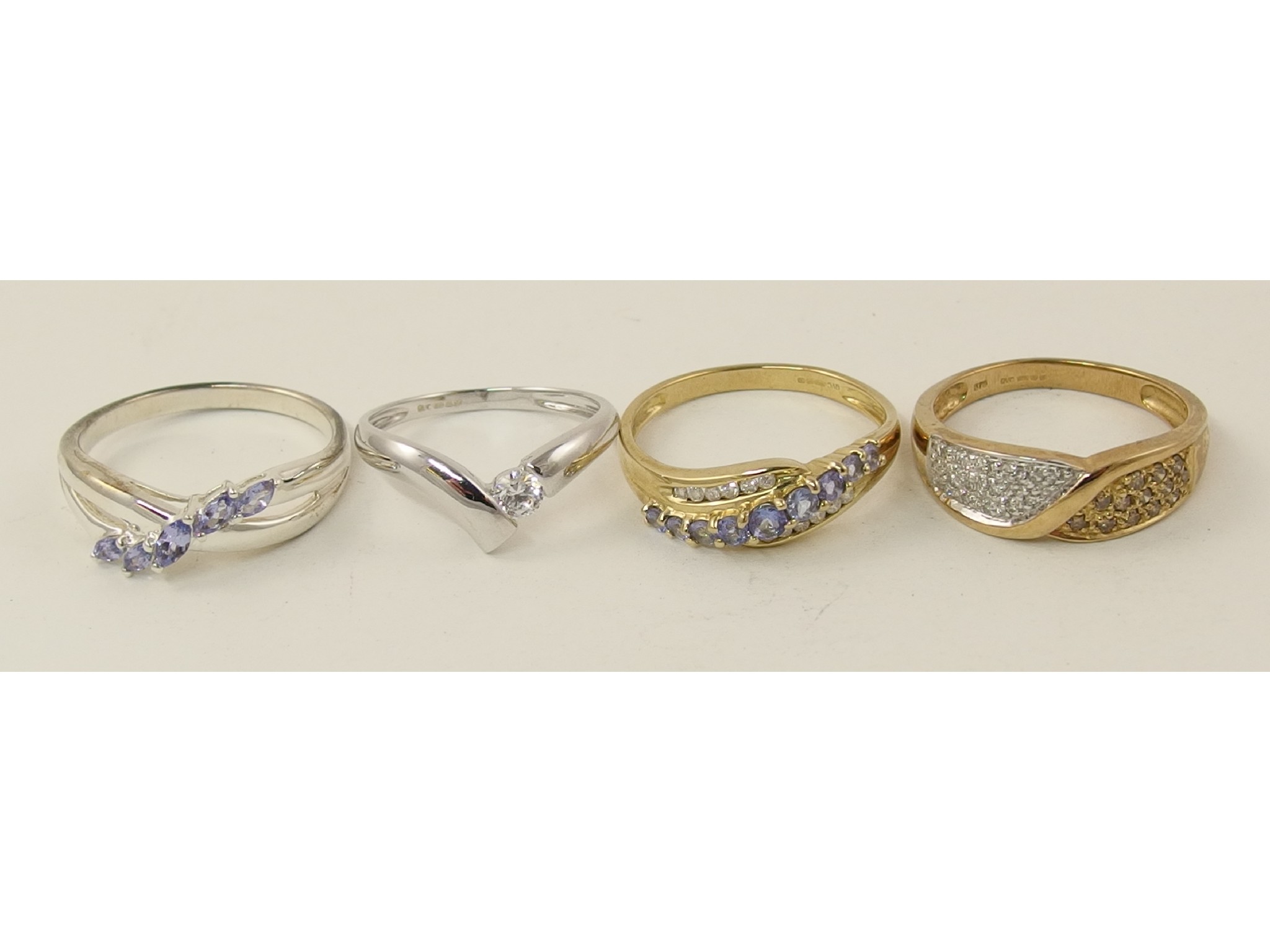 Appraisal: A ct champagne and white diamond ring a tanzanite and