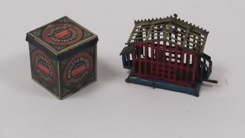 Appraisal: A Huntley Palmers miniature biscuit tin and a bird cage