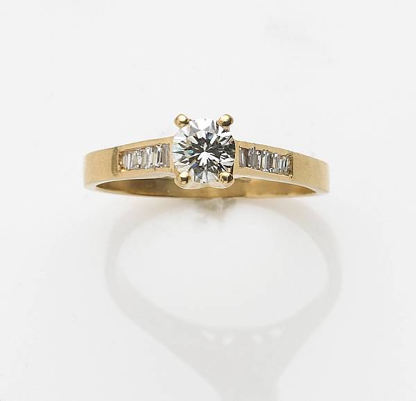 Appraisal: A diamond and k gold engagement ring center diamond weighing