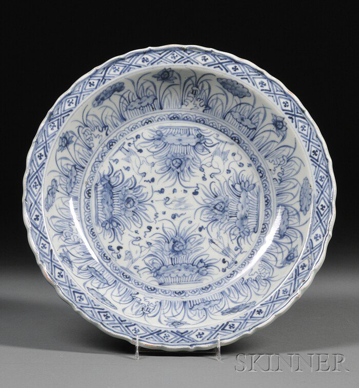 Appraisal: Porcelain Plate China foliate edge underglaze blue decoration of lotus