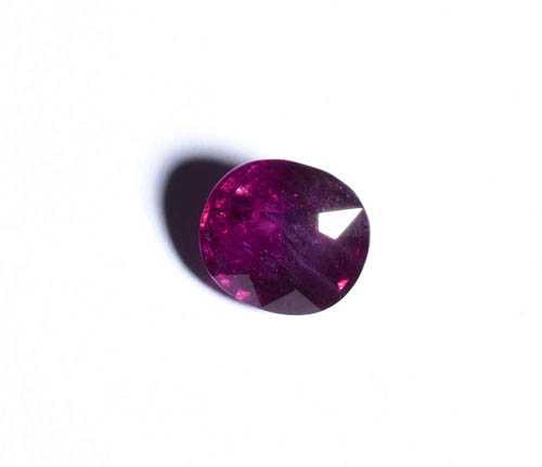 Appraisal: UNSET RUBY Unset oval ruby of ct treated With copy