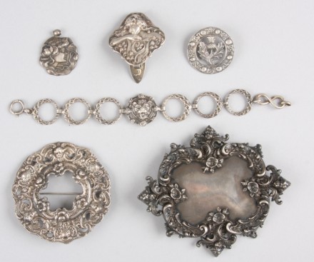 Appraisal: Sterling buckle Victorian style repousse with cherub and floral motif