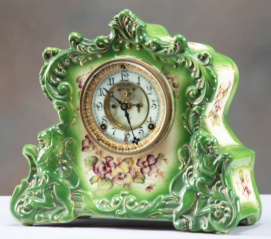 Appraisal: Antique Ansonia China Clock green circa -day time and strike