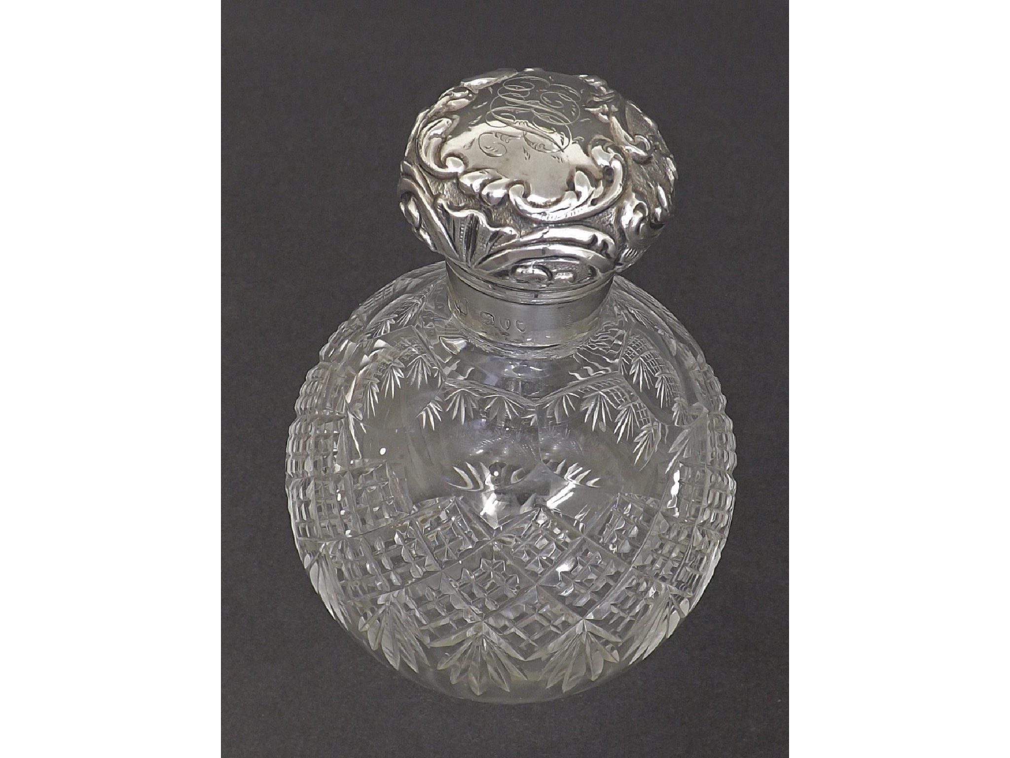 Appraisal: Late Victorian cut glass and silver topped spherical scent bottle