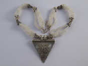 Appraisal: A white metal tests silver and moonstone necklace central pendant