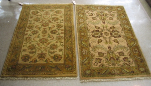 Appraisal: TWO HAND KNOTTED ORIENTAL AREA RUGS Indo-Persian similar overall floral