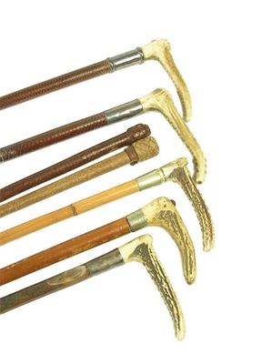 Appraisal: Five antler handle riding crops with silver and nickel mounts