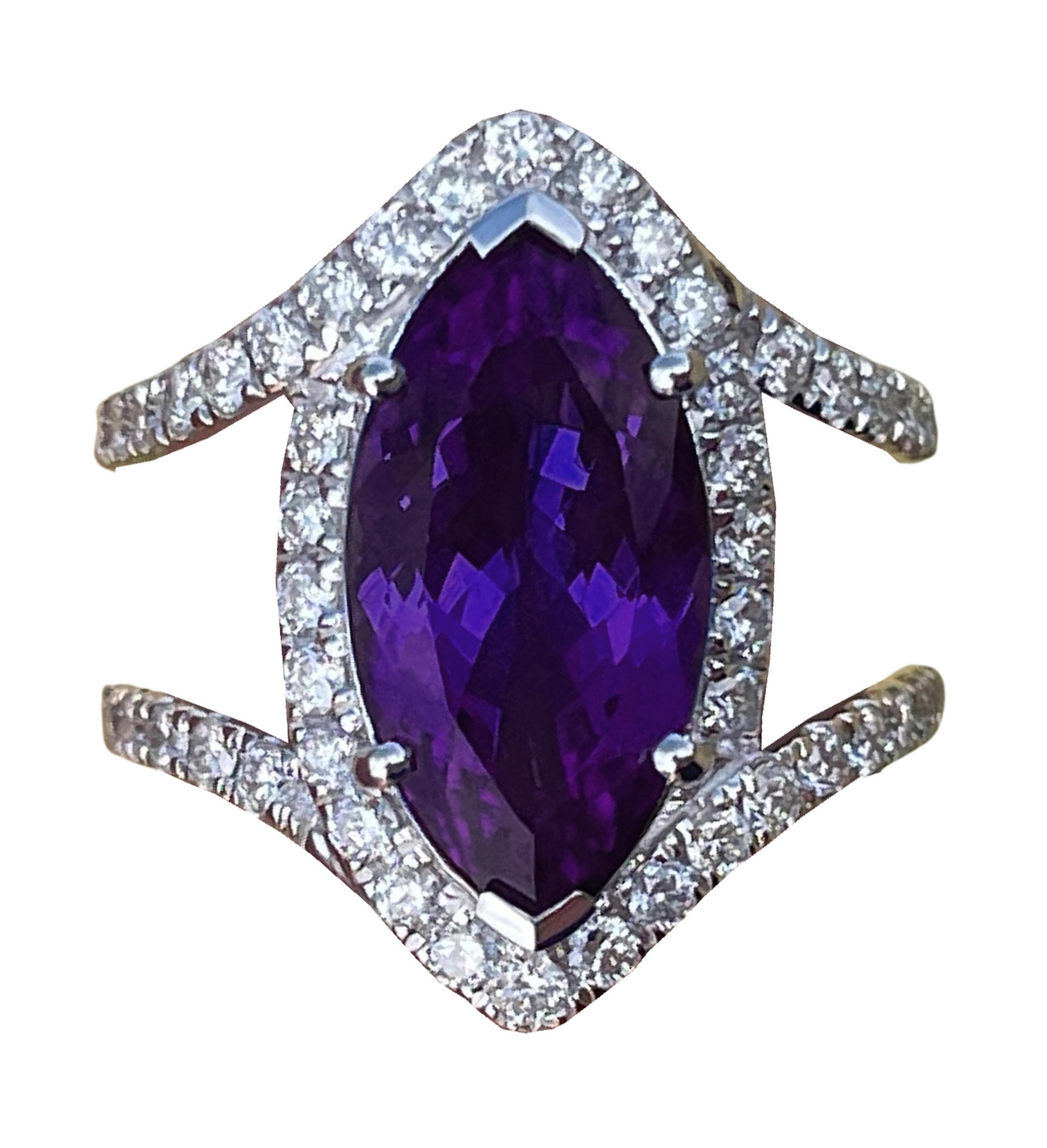 Appraisal: K WG TANZANITE DIAMOND RING K white gold Tanzanite and