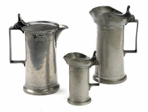 Appraisal: A group of three th century continental pewter lidded measures