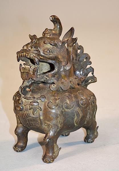 Appraisal: Chinese th C bronze foo dog censer Chinese th C