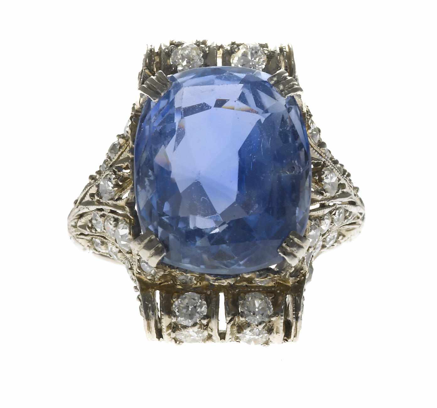 Appraisal: A sapphire and diamond ring cushion-cut sapphire weighing approximately carats