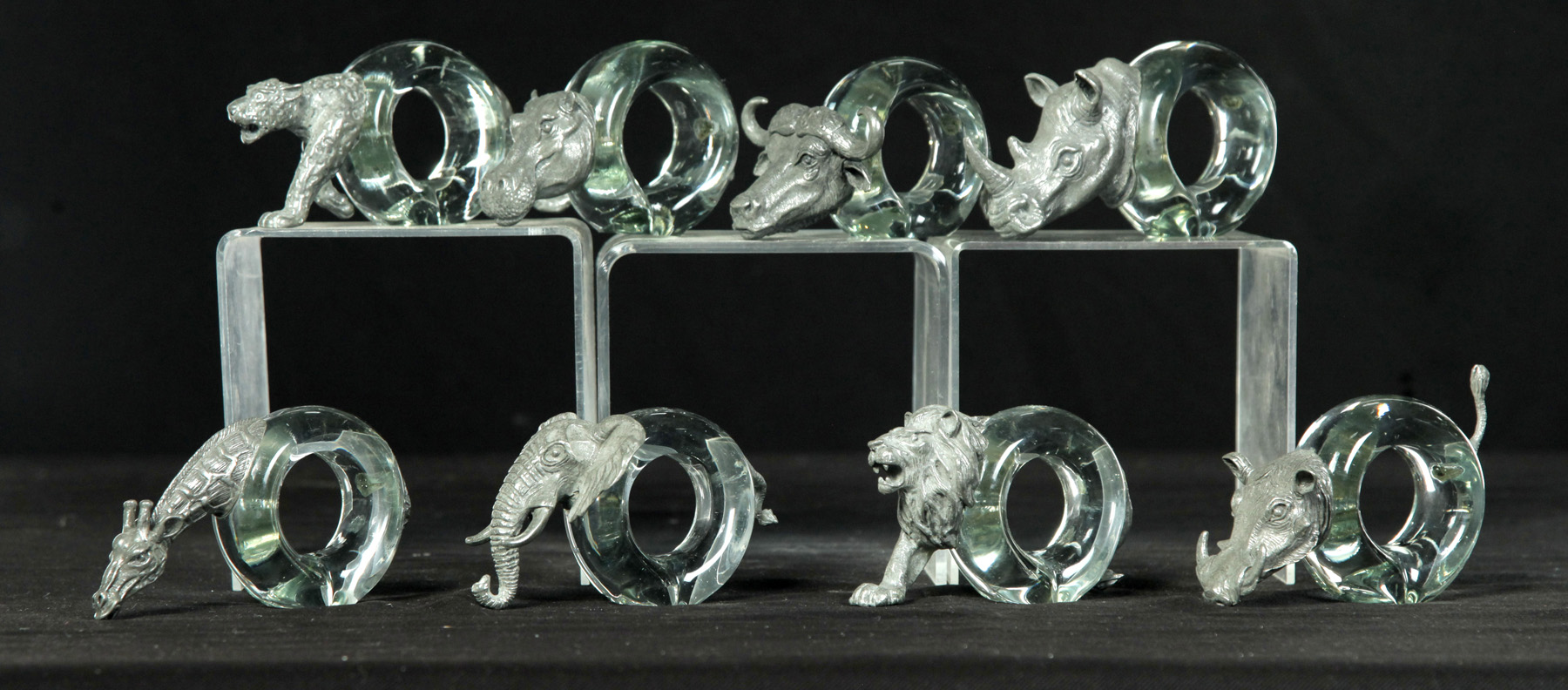 Appraisal: EIGHT AFRICAN ANIMAL NAPKIN RINGS American nd half- th century