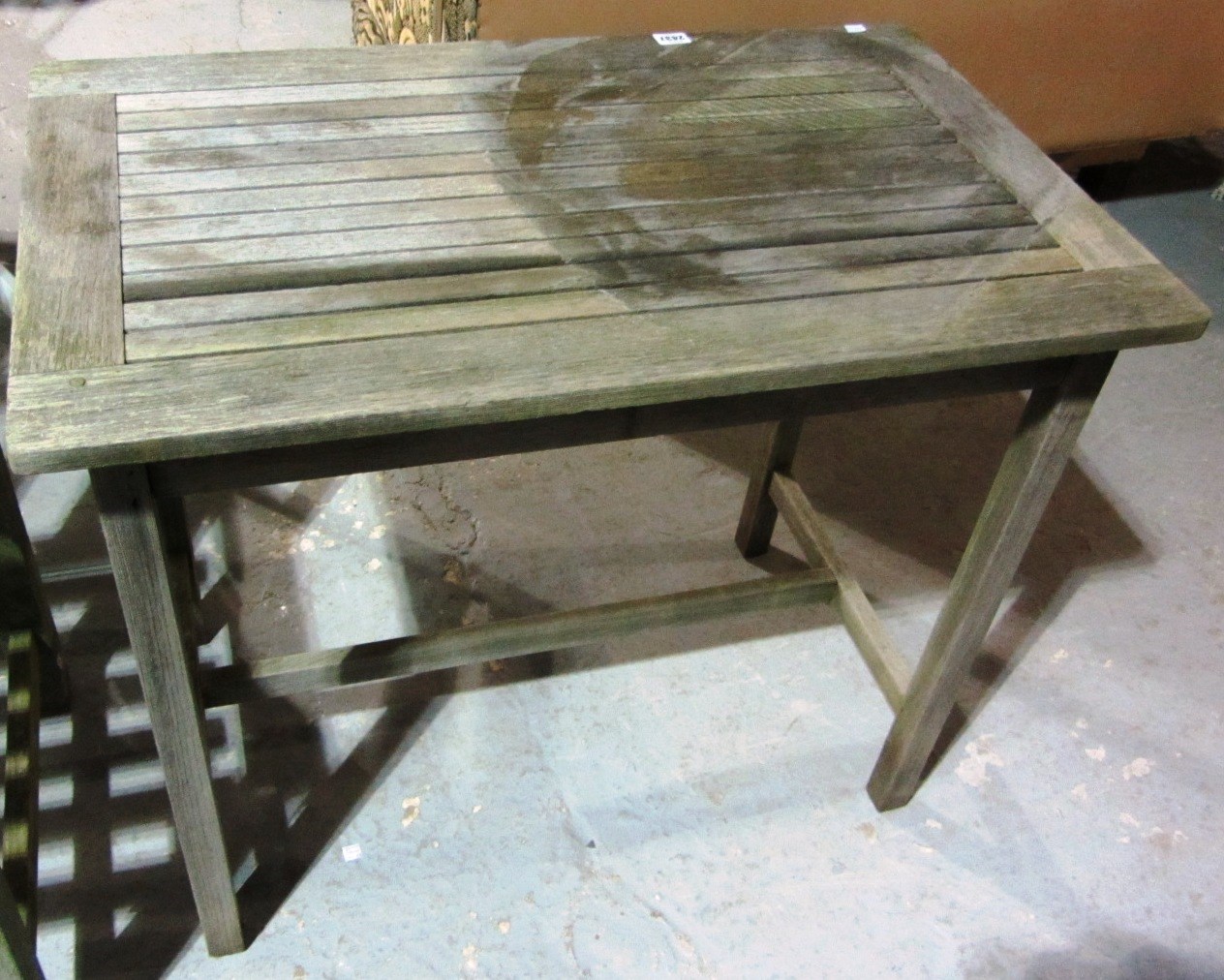 Appraisal: A teak rectangular garden table