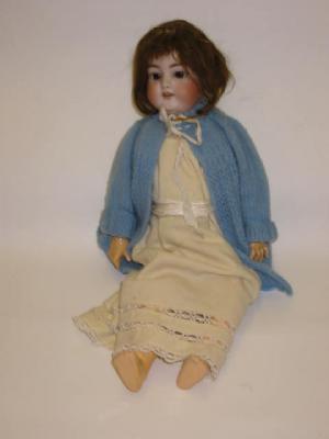 Appraisal: A Simon Halbig bisque head girl doll with brown glass