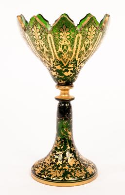 Appraisal: A Victorian green glass vase cut crenelated rim on trumpet