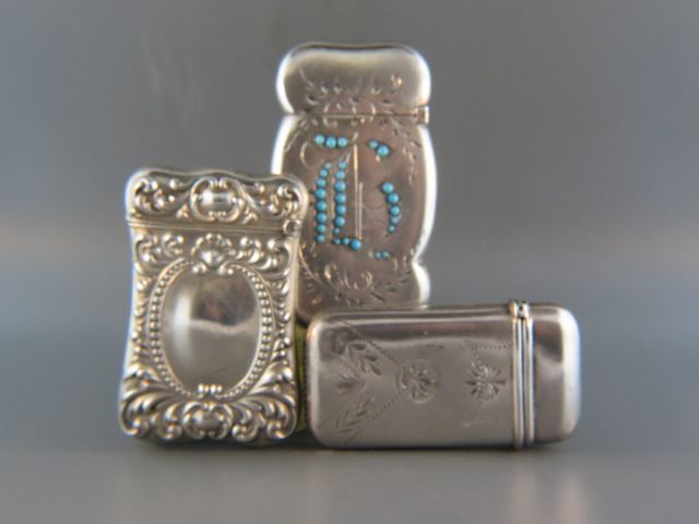 Appraisal: Sterling Silver Match Safes including turquoise inset by Spaulding largest