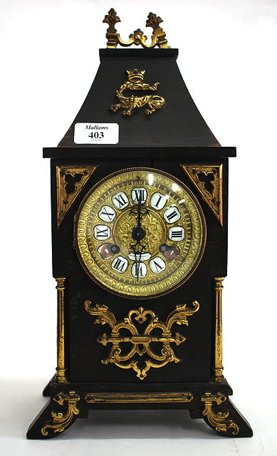 Appraisal: A HOWELL JAMES CO OF LONDON EBONISED PINE MANTEL CLOCK