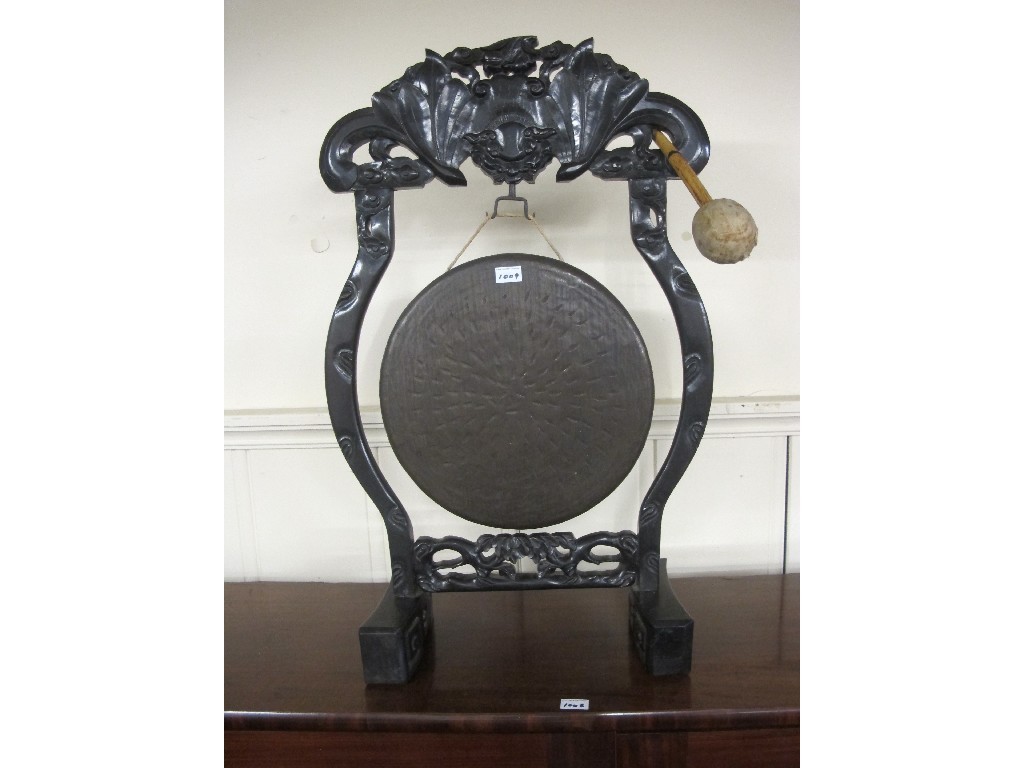 Appraisal: Chinese hardwood dinner gong