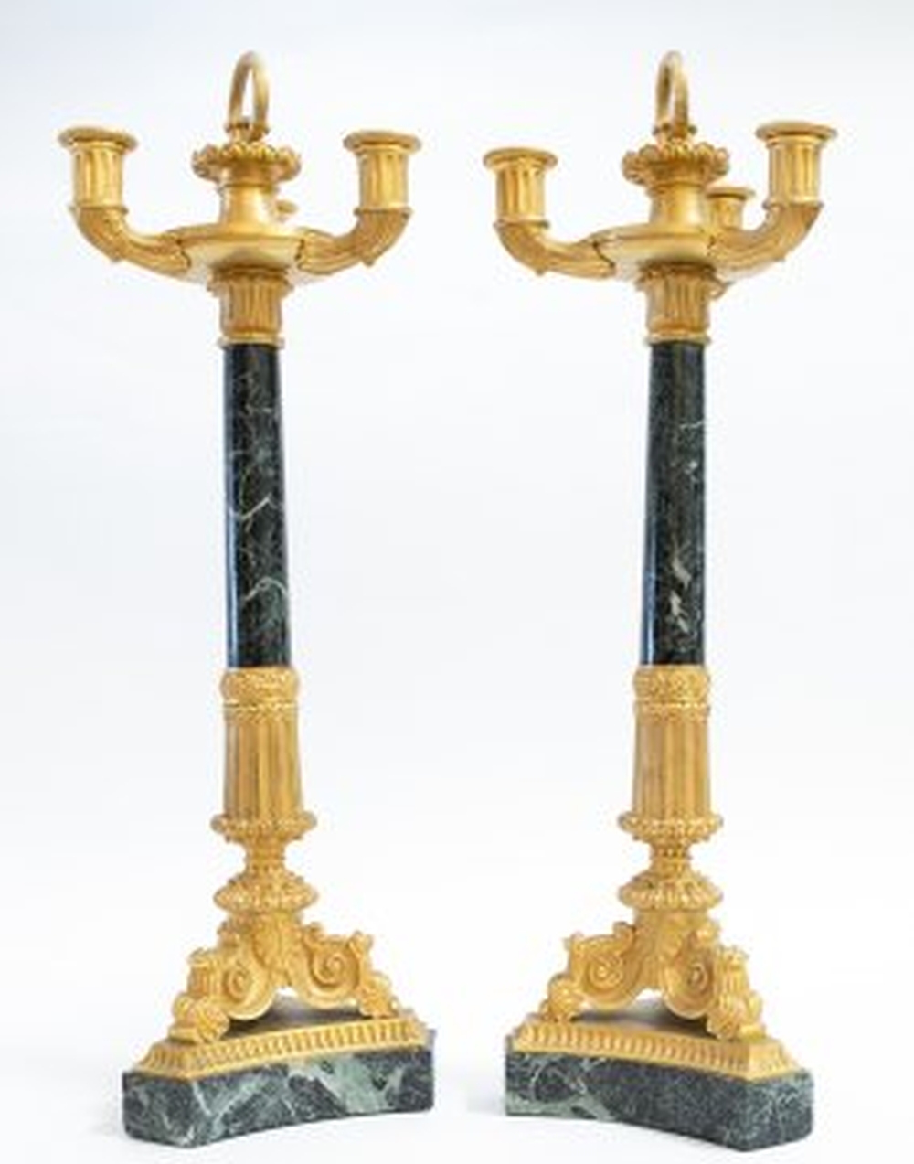 Appraisal: PAIR GILT BRONZE MARBLE THREE-LIGHT CANDELABRAFrench In a Charles X