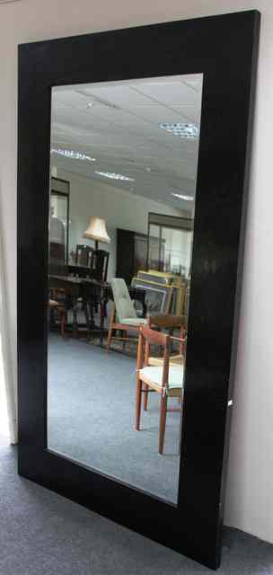 Appraisal: A large mirror with rectangular bevelled plate within a Chinese