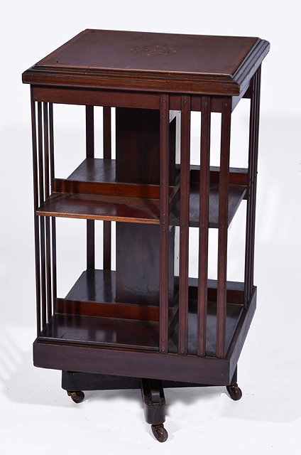 Appraisal: AN EDWARDIAN MAHOGANY SATINWOOD AND INLAID REVOLVING BOOKCASE with square