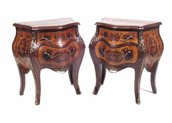 Appraisal: A pair of Louis XV style marquetry decorated petite commodes