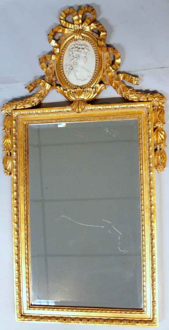 Appraisal: A thC neo-classical design wall mirror the rectangular glass surmounted